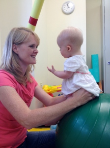 Lyra working with her physical therapist